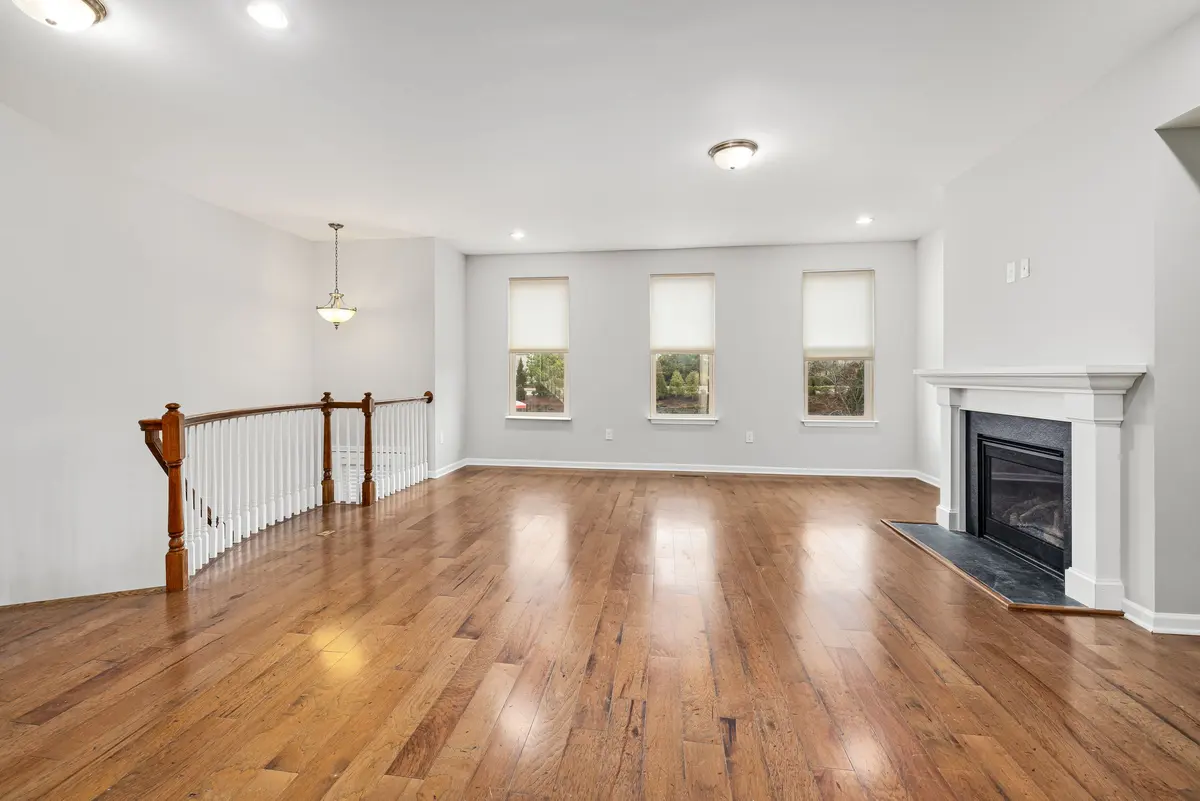 Bright hardwood flooring in an open living room